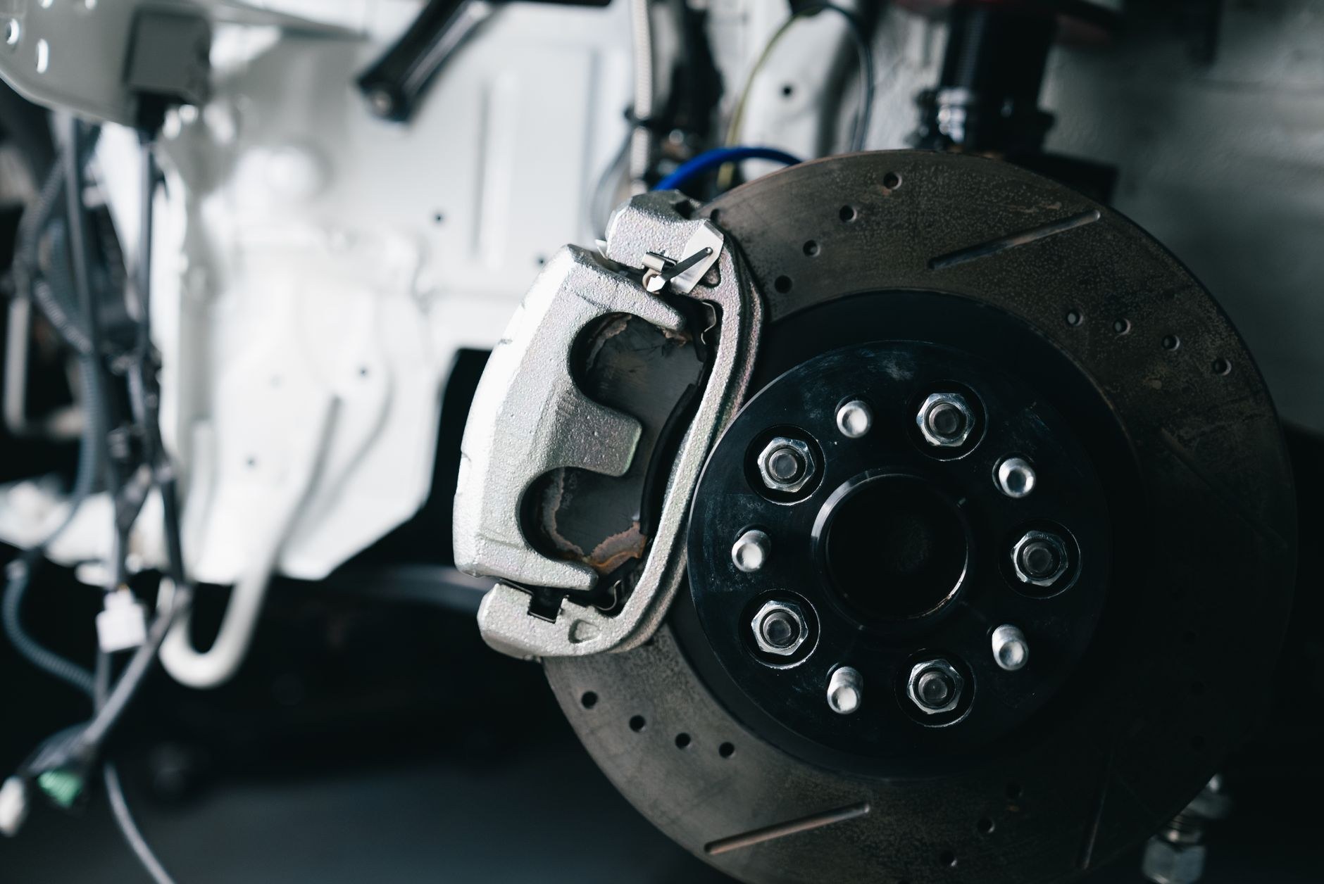 Brake assembly on a workshop hoist during a repair