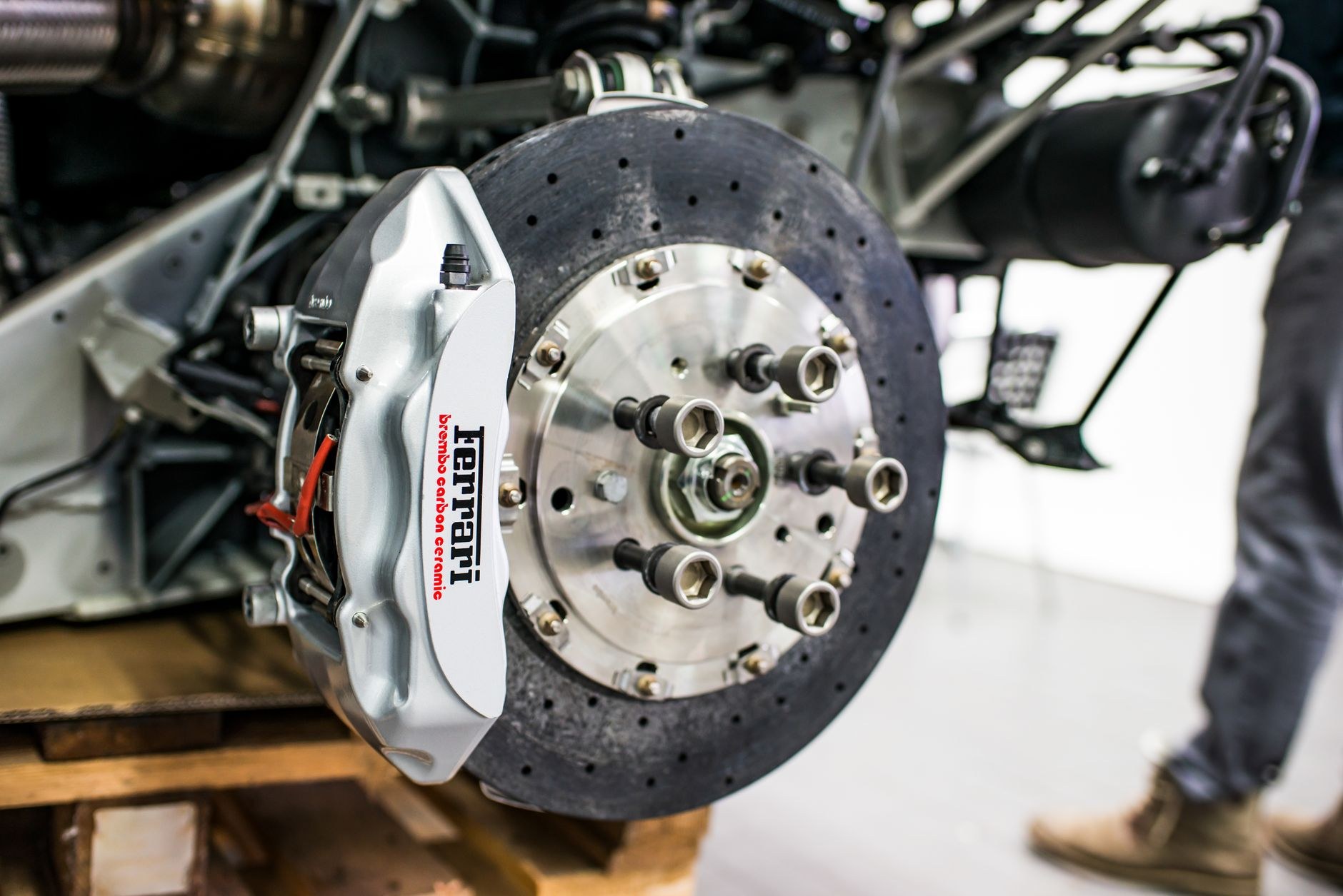 Drilled brake disc and caliper on a wheel hub